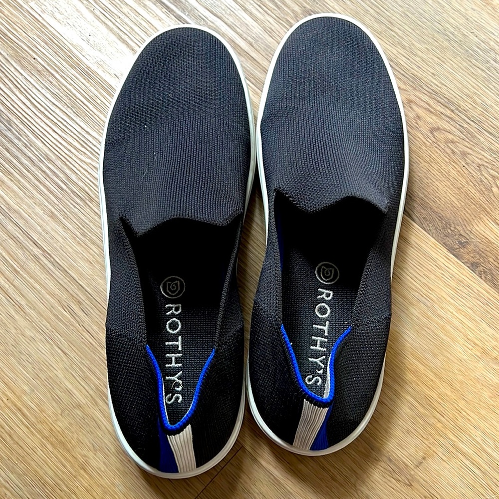 Good condition, black Rothy’s slip on sneakers, size 9.5